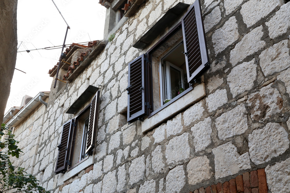 Shuttered windows - Old houses with shuttered windows