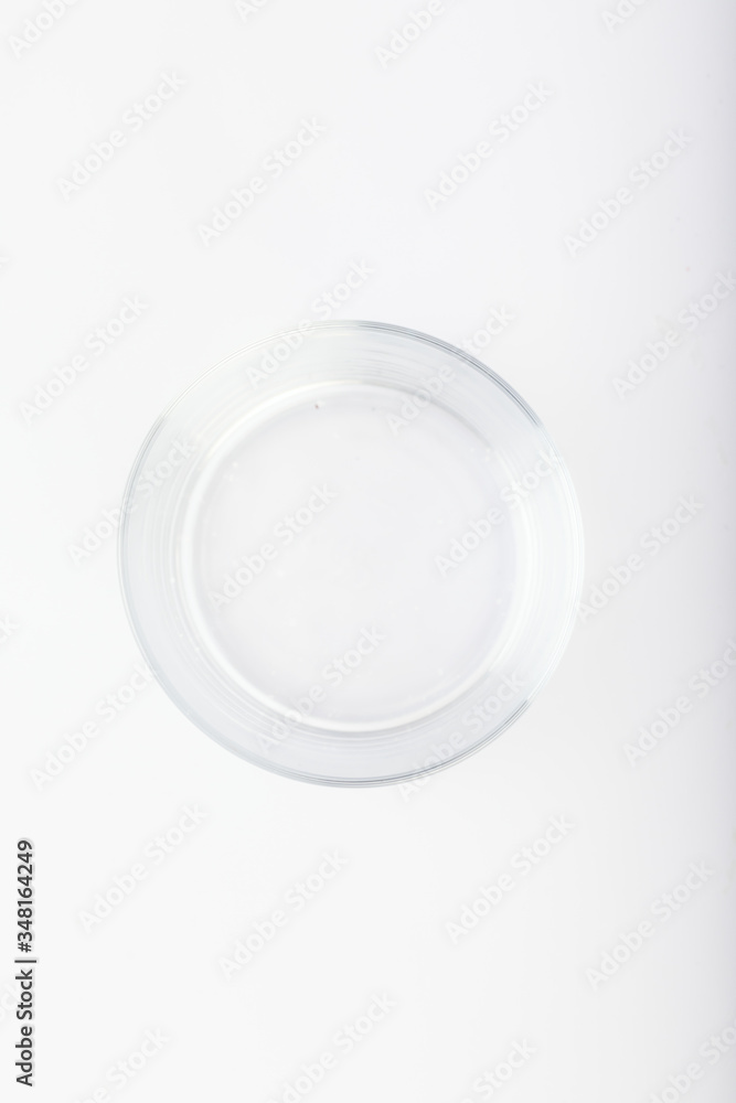 Glass bowl on white background. Empty bowl glass isolated. top view, copy space. Glass bowl on white background. Empty bowl glass isolated. top view, copy space.