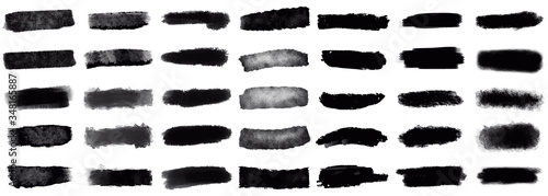 Brush paint strokes. Texture brushes and modern grunge brush lines. Ink brush artistic design element for frame design. Vector isolated elements set. Grungy black swatches. Rough smears and stains