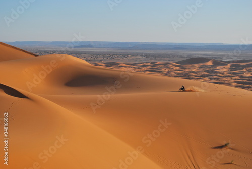 Riding motorbike in the desert