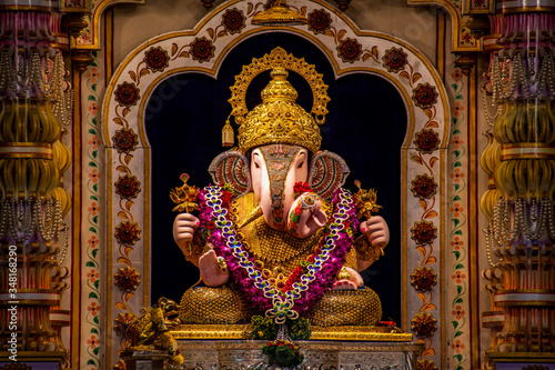 Photo Dagdusheth Ganapati Idol at pune with golden jewellery and beautiful decoration