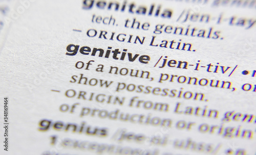 Genitive word or phrase in a dictionary.