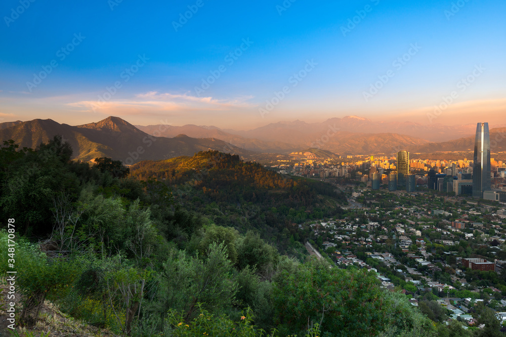 Panoramic view of Santiago with Parquemet Metropolitan park and Cerro Manquehue at sunset, Santiago de Chile, Chile