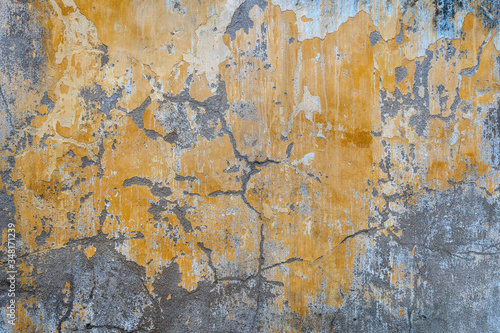 Background of old yellow painted wall texture
