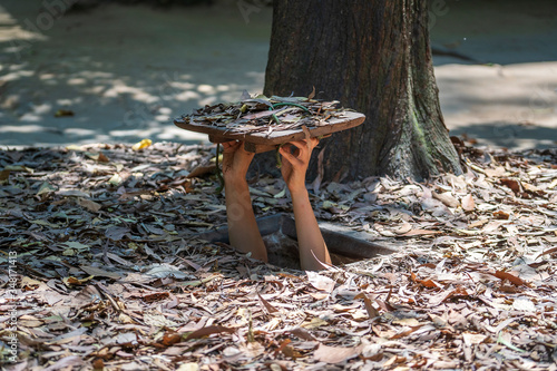Tourist at the entrance of Cu Chi Tunnels in Ho Chi Minh, Vietnam, closeup