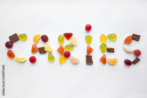 Sweetened assortment of multicolored candies.