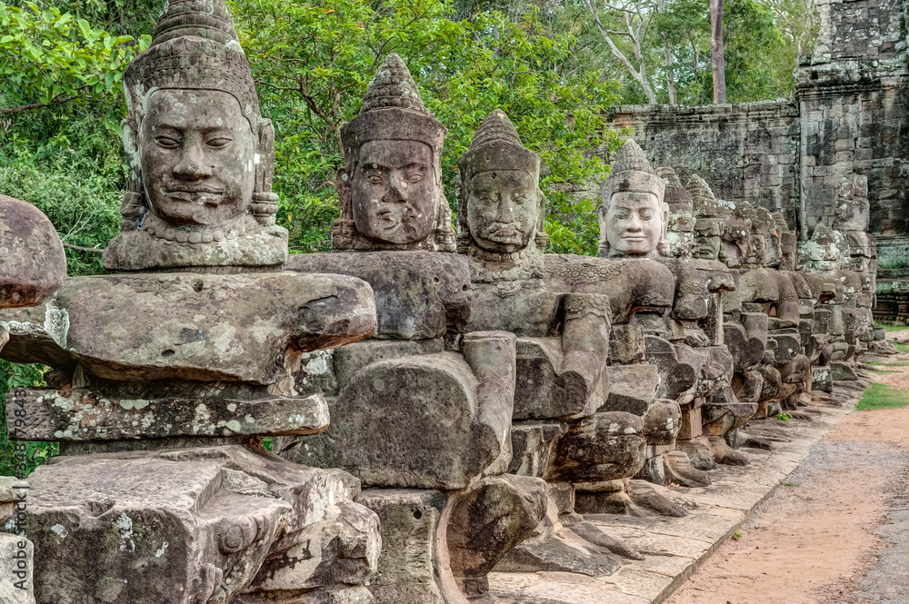 Statues on the Bridge Leading to the Victory Gate in the Ancient City of Angkor Thom, Cambodia Statues on the Bridge Leading to the Victory Gate in the Ancient City of Angkor Thom, Cambodia