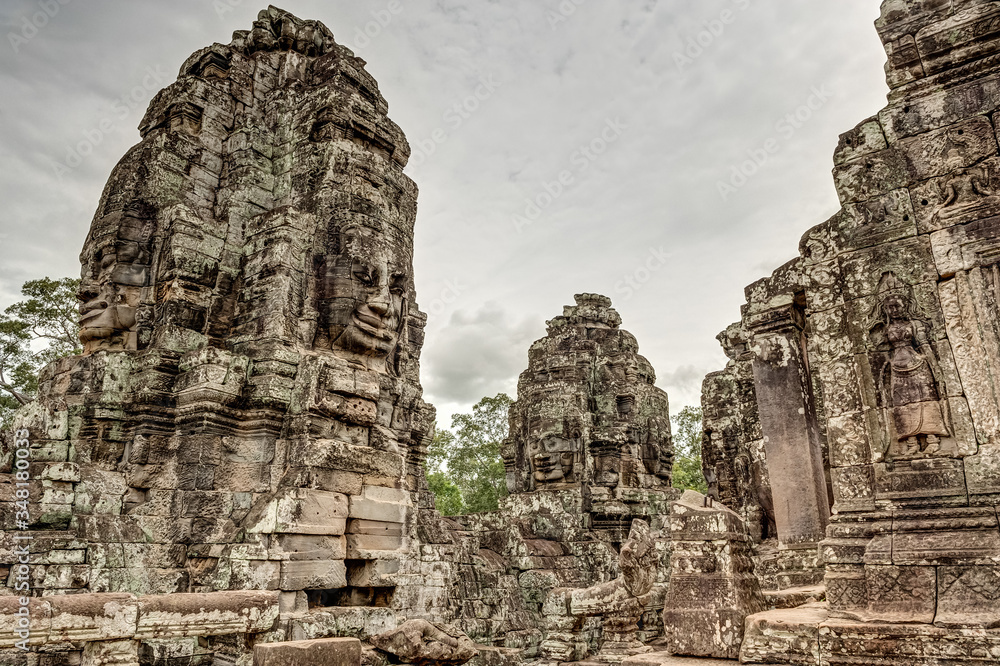 The Stone Face Towers Depicting King Jayavarman VII or Lokesvara, The Bayon Temple, Angkor Thom, Cambodia The Stone Face Towers Depicting King Jayavarman VII or Lokesvara, The Bayon Temple, Angkor Thom, Cambodia