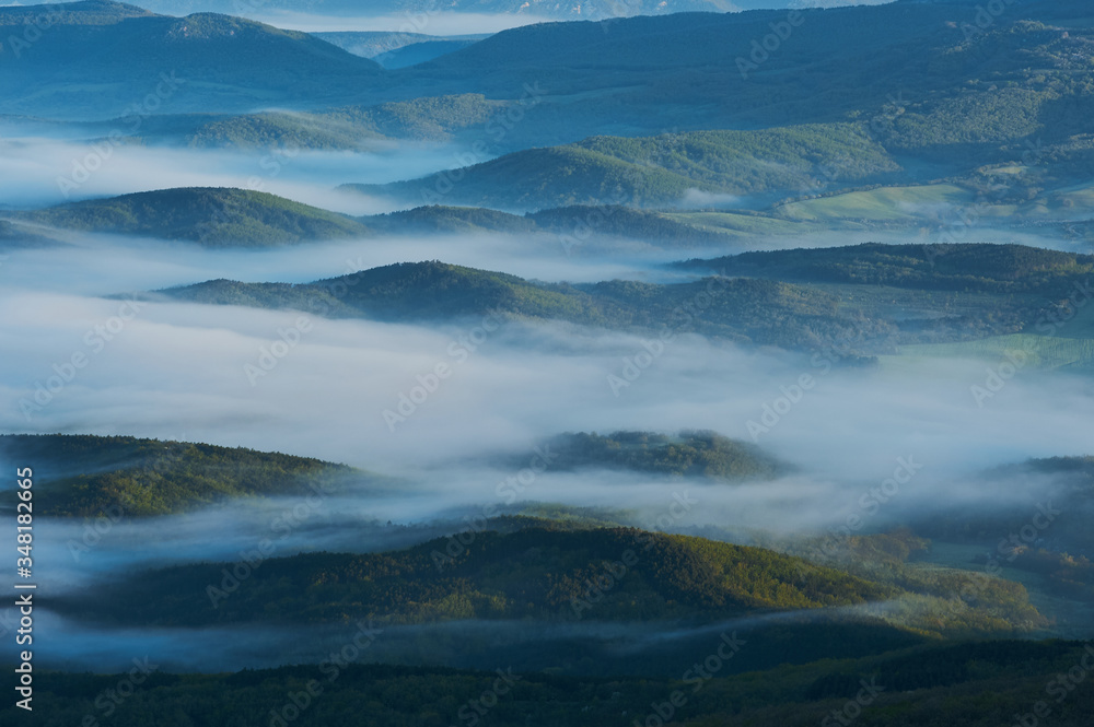 Beautiful morning landscape with fog in the mountains. Beautiful morning landscape with fog in the mountains.