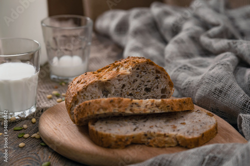 Rustic breakfast with milk and bread. World Milk Day on the first of June. Horizontal shot from above.