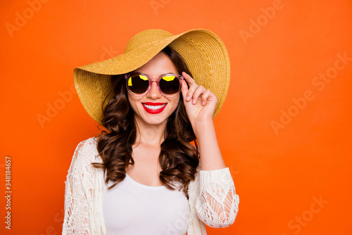 Photo of cheerful positive cute pretty nice charming girlfriend smiling toothily wearing glasses isolated over vivid color background