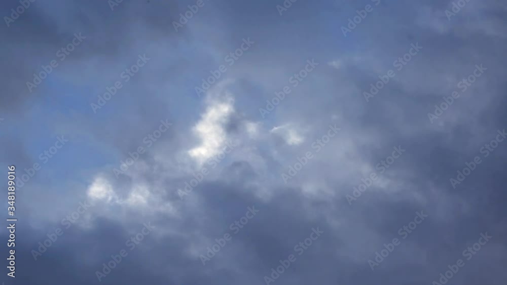 Invasion of dark blue clouds of a hurricane in the sky, background, time-lapse Invasion of dark blue clouds of a hurricane in the sky, background, time-lapse