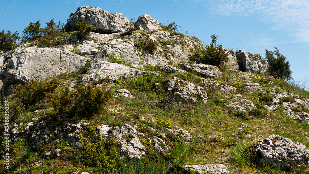 View of the Sokolich Mountains Reserve and rock stones in Olsztyn. A free space for an inscription View of the Sokolich Mountains Reserve and rock stones in Olsztyn. A free space for an inscription
