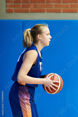 Girl play basketball © Sergey Ryzhov
