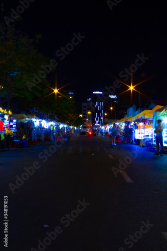 A night neon street at Ben Thanh market in Ho Chi Minh Vietnam wide shot photo