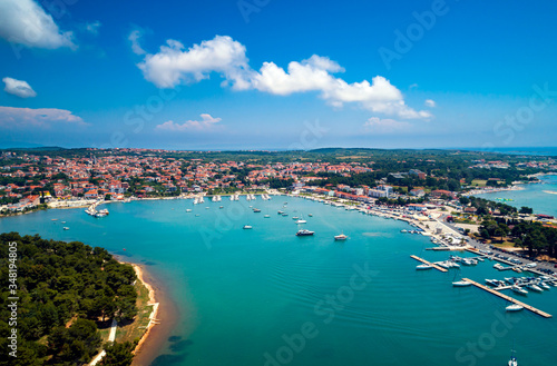 Aerial view from Medulin town and Medulin marina and boats under beautiful blue sky with nice white clouds aerial view, Croatia 