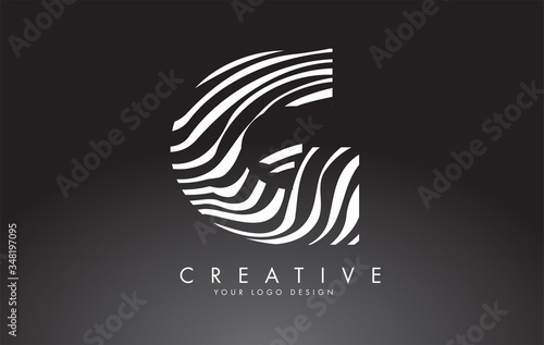 G Letter Logo Design with Fingerprint, black and white wood or Zebra texture on a Black Background.