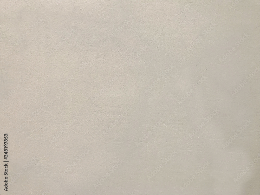 Naklejka premium Beige painted wall surface of interior building. Close up empty space wallpaper.