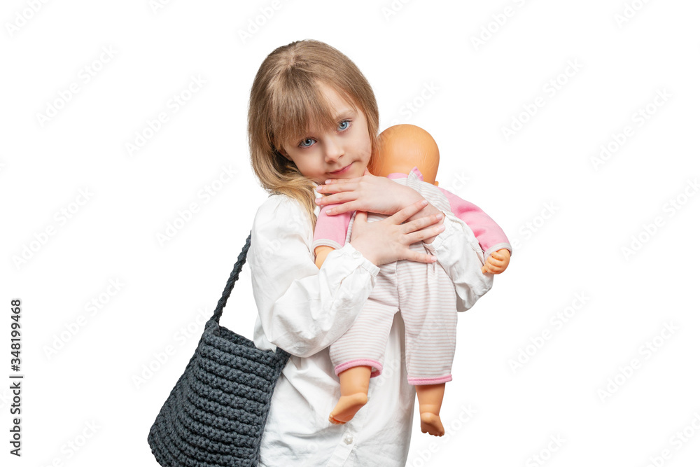 girl hugging a doll girl hugging a doll