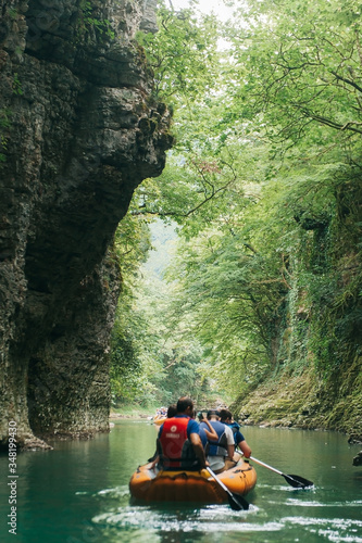 Martvili Georgia June. A group of tourists floating in a rubber boat on the river Martvili canyon.