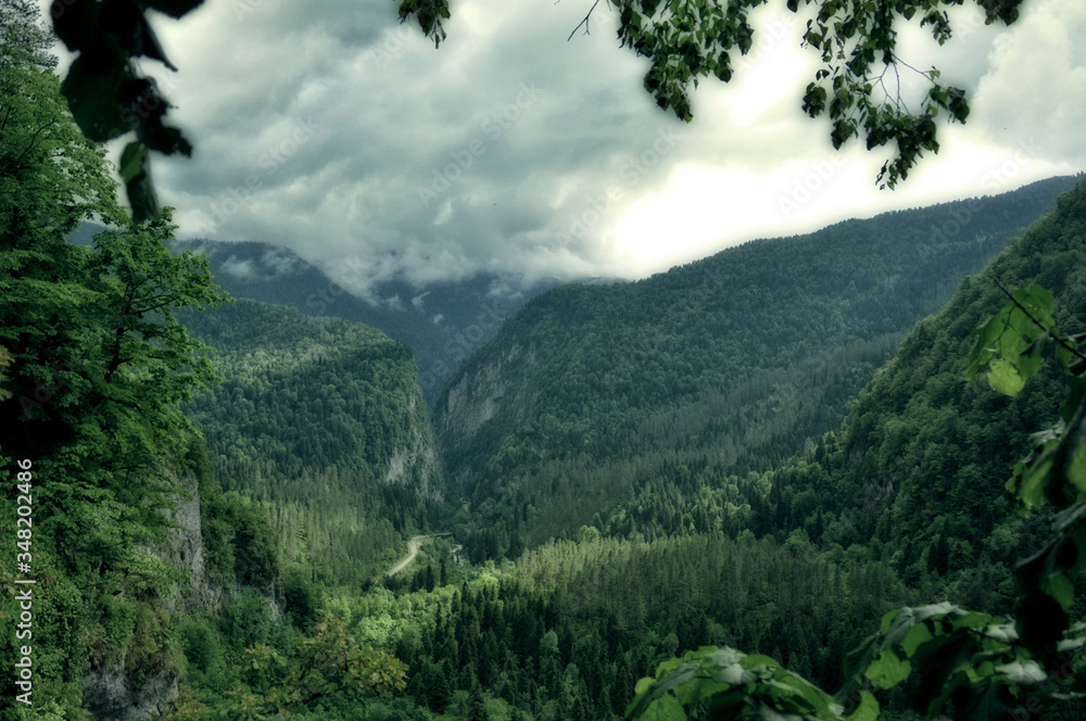 mystic mountain landscape with clouds