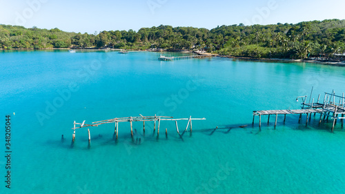 Aerial drone of old broken wooden pier at Bang Bao Bay on tropical island Koh Kood  Thailand