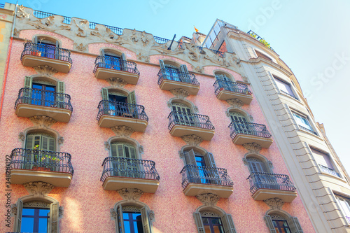 Photography pink house with balcony in spanish style