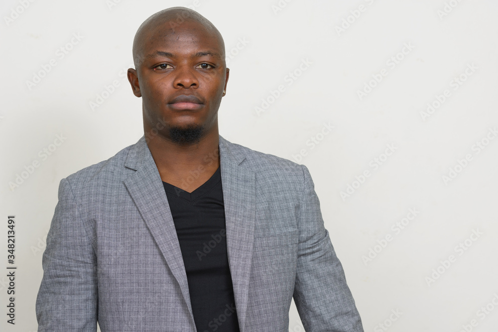 Young handsome bald African businessman in suit Young handsome bald African businessman in suit