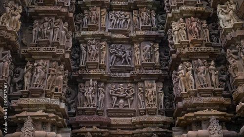 Erotic sculptures at the Parshvanatha temple, within the Khajuraho Group of Monuments in the Chhatarpur district, Madhya Pradesh, India, Asia photo