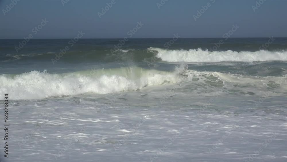 Big breaking waves at the Nazare North Beach (Praia do Norte). Portugal Big breaking waves at the Nazare North Beach (Praia do Norte). Portugal