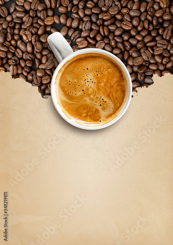 hot black coffee on bean coffee pattern old brown paper background. space for text © memorystockphoto