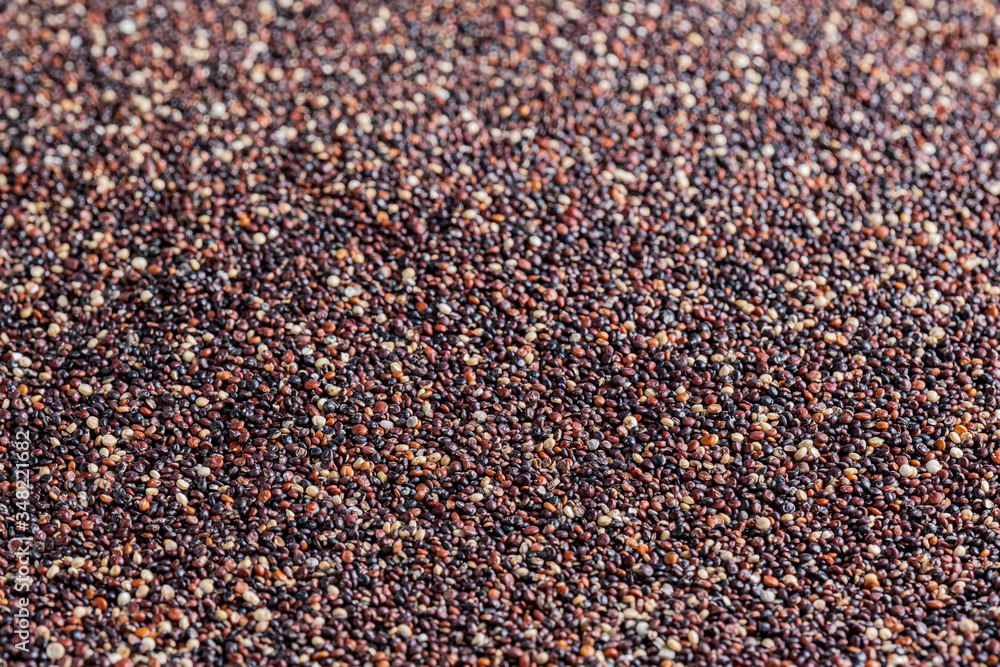Healthy food background with red and black raw quinoa. Gluten free concept. Copy space. Healthy food background with red and black raw quinoa. Gluten free concept. Copy space.