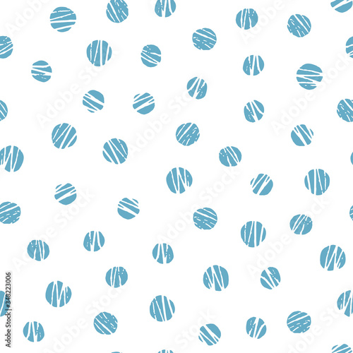 Vector blue polka dot seamless pattern. Winter abstract background. Hand drawn circles great for nursery design.