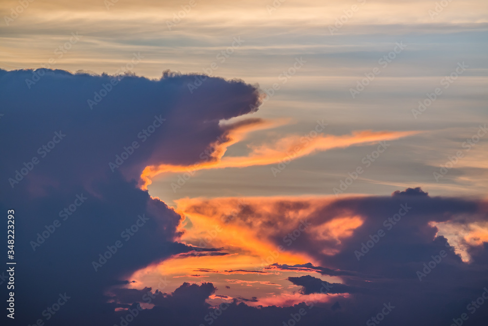 Beautiful sunset with twilight sky and cloud. sunset and light rays from clouds shining to sky. Heaven in nature. Nature cloudscape background sunrise or sunset scene.