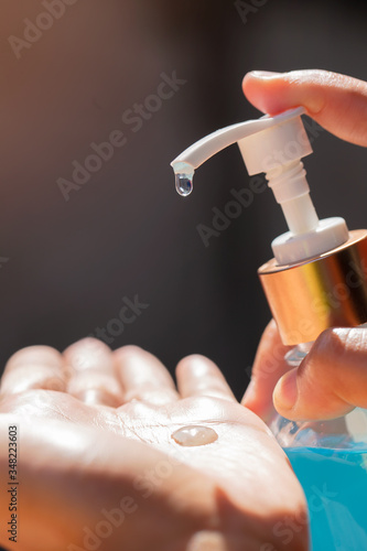 Wallpaper Mural alcohol gel is dripping down to clean the hands to help prevent virus and plague infection, prevent covid-19  Torontodigital.ca