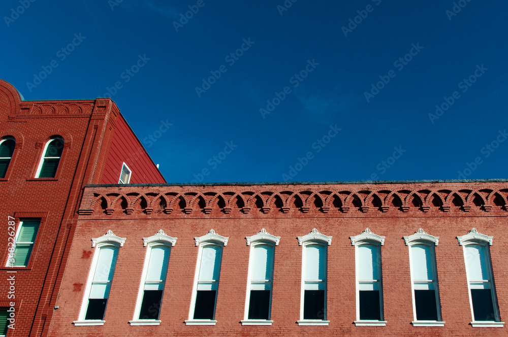 Historic brick building in Downtown McKinney, Texas, a suburb of Dallas, Texas. 