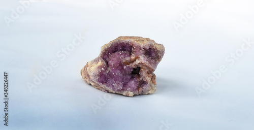 Raw sample of violet amethyst crystals