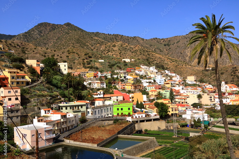 Colorful homes in Vallehermoso town and valley on the island of La Gomera, Canary Islands, Spain