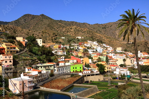 Fototapeta Naklejka Na Ścianę i Meble -  Colorful homes in Vallehermoso town and valley on the island of La Gomera, Canary Islands, Spain
