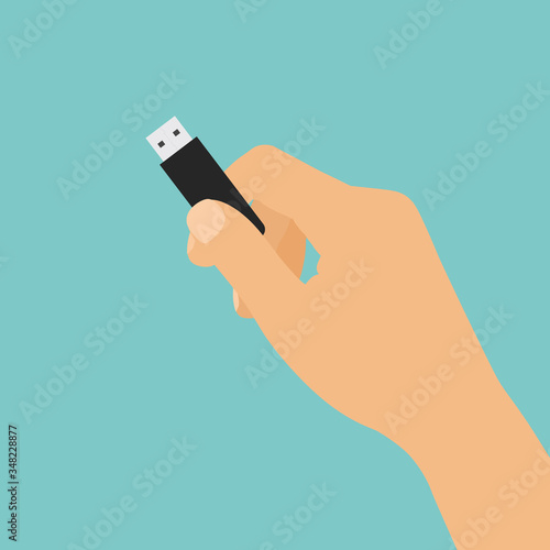 Flat design cartoon illustration of hand holding USB flash drive, vector