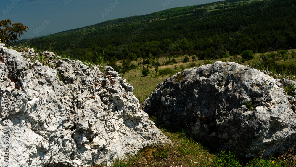 View of the Sokolich Mountains Reserve and rock stones in Olsztyn. A free space for an inscription