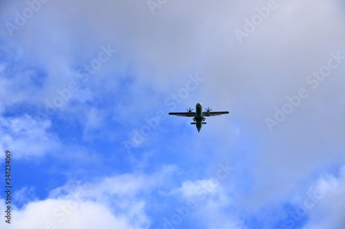 January 25 2020 - La Gomera, Canary Islands in Spain: Airplane flying in the sky over the Island