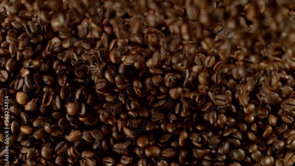 Super slow motion of falling coffee beans. Filmed on high speed cinema camera, 1000 fps. Super slow motion of falling coffee beans. Filmed on high speed cinema camera, 1000 fps.