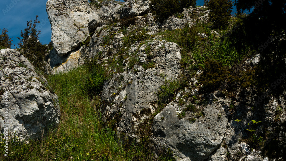 View of the Sokolich Mountains Reserve and rock stones in Olsztyn. A free space for an inscription View of the Sokolich Mountains Reserve and rock stones in Olsztyn. A free space for an inscription