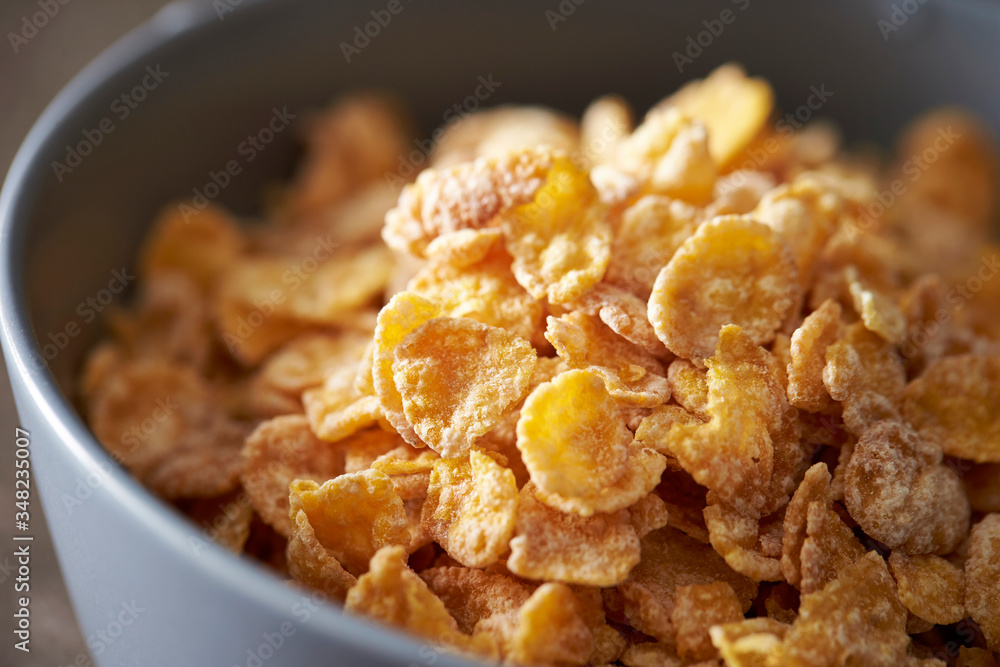 Corn flake and milk eating with spoon Corn flake and milk eating with spoon