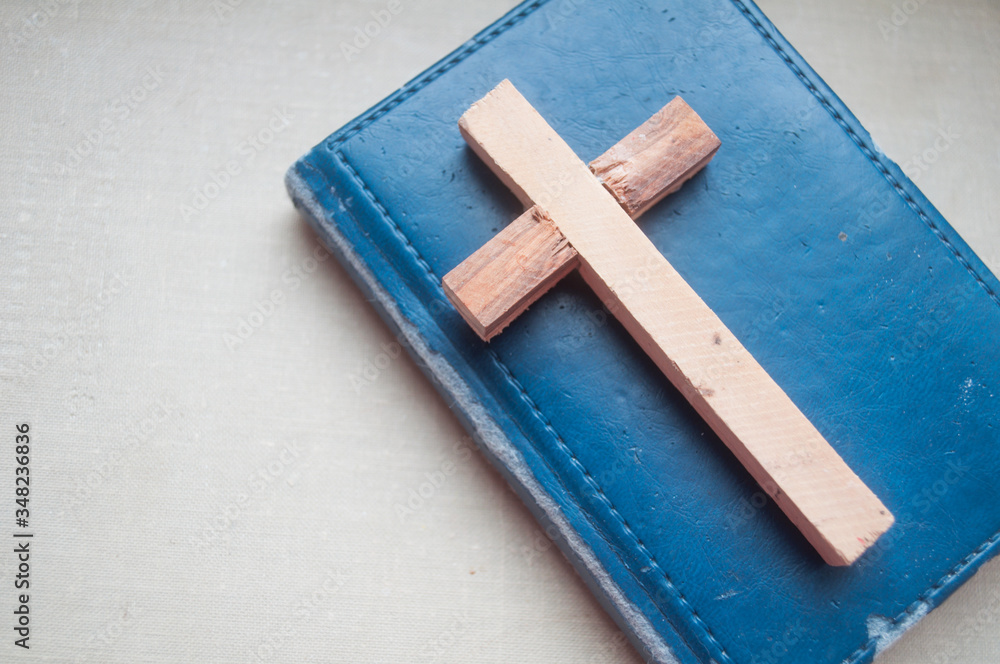 old bible and wooden cross, world prayer day, international prayer day, easter day,