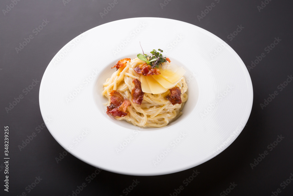 Fototapeta premium Italian pasta carbonara with bacon