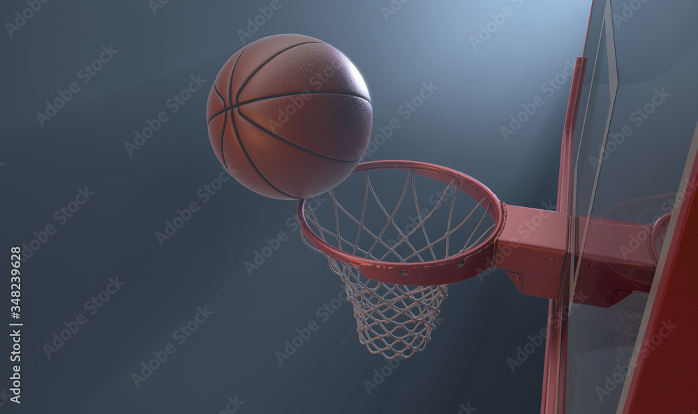 An action shot of a regular basketball teetering on the rim of a red basketball hoop dramatically spotlit from behind on an isolated dark background - 3D render