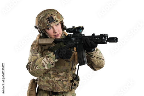 Female soldier in tactical black uniform with rifle. Shot in studio. Isolated with clipping path on white background