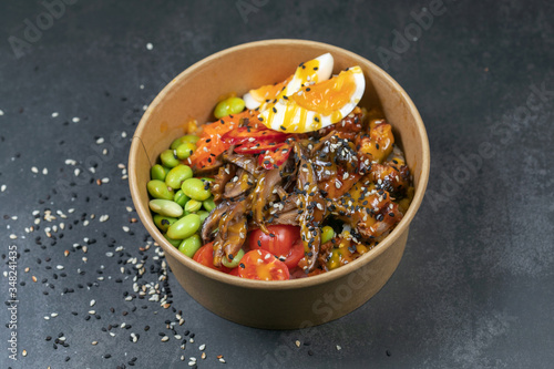 Poke bowl with moshroom, rice, agg and vegetables photo